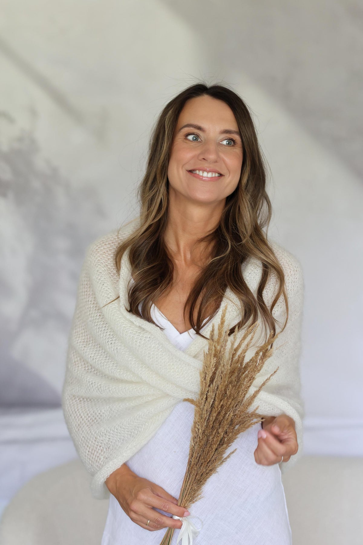 Twisted scarf knitted from mohair and silk with honeycomb pattern